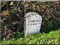 NX9575 : Old Milestone by the A711, Troqueer parish by Milestone Society