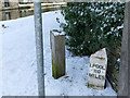 Milestone next to Morton swing bridge