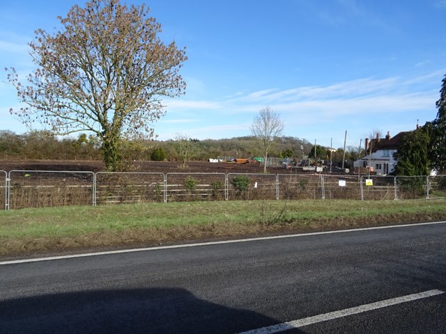 Cleared land beside the former Plough and Harrow Inn
