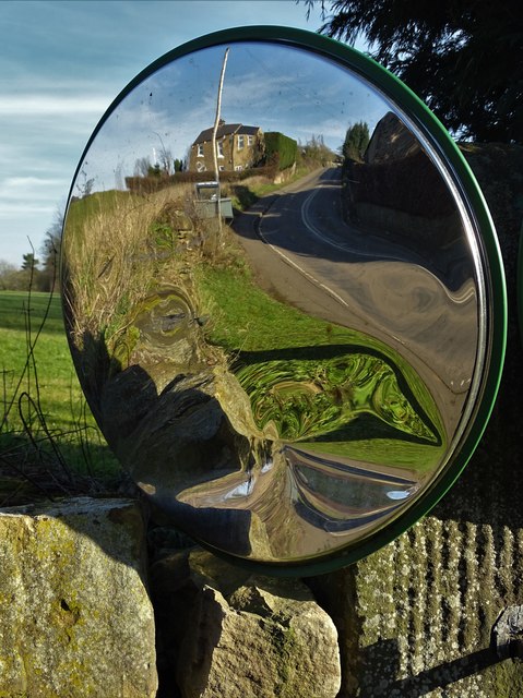 Convex traffic mirror by a bend at Ford