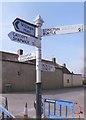 Direction Sign - Signpost on Broadway, Edington