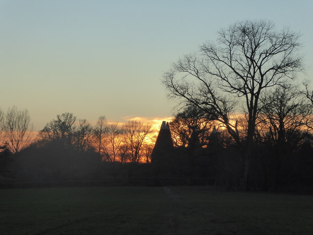 Oast houses at sunset