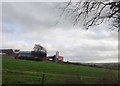 Drumlin top farm buildings East of the A27