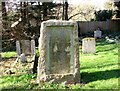 The church of All Saints in Postwick, churchyard