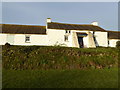 SM7424 : Pen-porth-clais farmhouse by Jeremy Bolwell