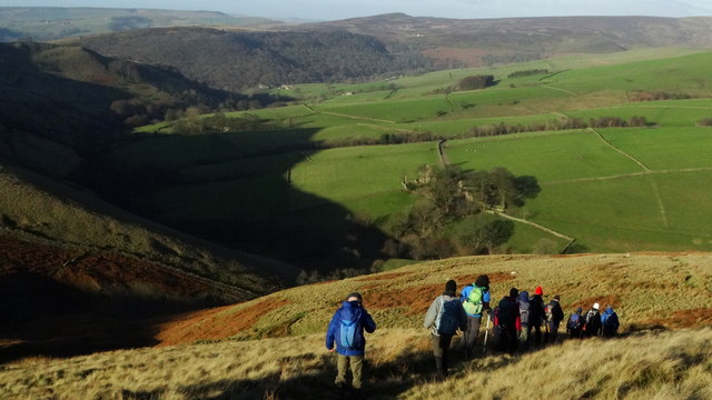 Walking group on path descending from South Head to South Head Farm