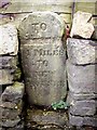 Old Milestone by the B6050, Stockport Road, Quick