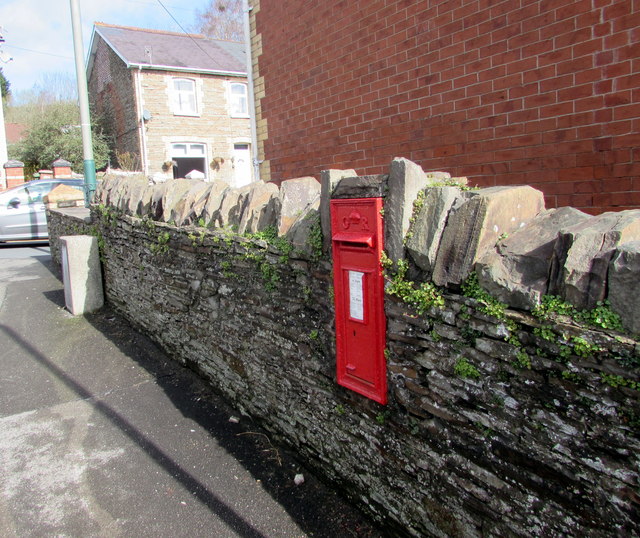 King George V postbox in a stone wall, Machen