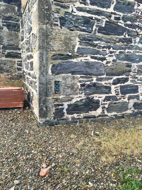 Corner of St John's Church, Portsoy showing OS flush bracket