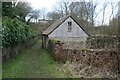 Wooden shed beside footpath