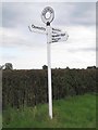 Direction Sign - Signpost by Maesbury Road, Maesbury