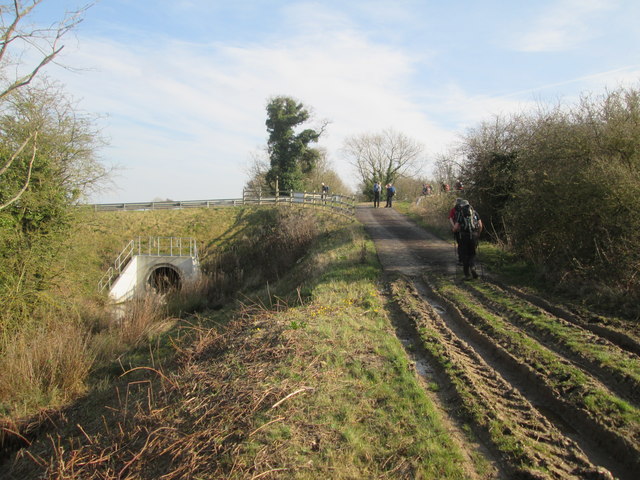 Drain  Lane  (track)  joins  the  A614  at  Caville  Bridge