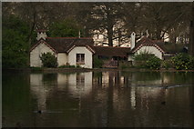 TQ2979 : View of the Swiss Chalet reflected in St. James's Park Lake by Robert Lamb