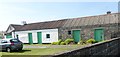 Traditional homestead buildings alongside the A50