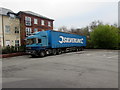 Tractor unit and Silverline trailer at the edge of Abergavenny bus station