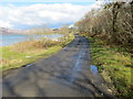 NR7575 : Road (B8024) beside the shore of Loch Caolisport by Peter Wood
