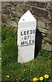 Milepost beside the Leeds and Liverpool Canal