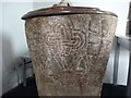 12th Century carved stone font inside St Iestyn