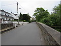 Gellihaf Road houses and a long stone wall, Fleur-de-lis