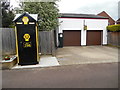 SP7308 : AA Telephone Box and disused Garage in Haddenham, Bucks by David Hillas