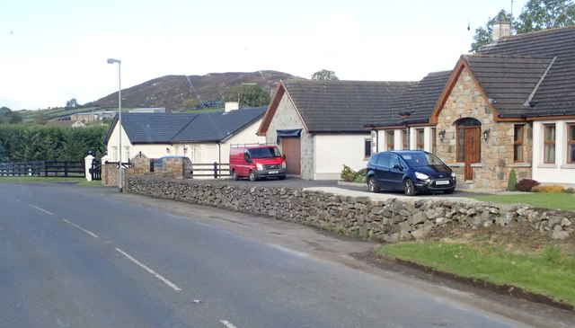 Bungalows on the B30 opposite Aughanduff Chapel