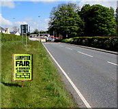 SN5748 : Lampeter Fair advert alongside Llanwnnen Road, Lampeter by Jaggery