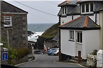 SW9339 : A glimpse of Portloe Cove and the harbour by Simon Mortimer