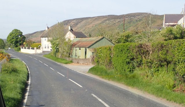 Houses and large corrugated iron shed on... © Eric Jones :: Geograph ...