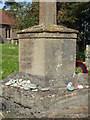 ST7288 : Colourful pebbles on the war memorial by Neil Owen