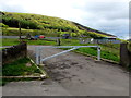 Metal barrier across an entrance to Maes McLaren, Abertysswg 