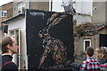 View of rabbit street art on the rear of the Great Wall Chinese takeaway on Evelina Road