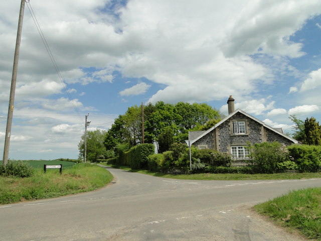 Corner Lodge with Bullockshed Lane on the left