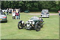 View of a Morgan three-wheeler entering the Coffee and Cars event at the Museum of Power