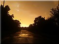 Yellow sky above Copthall Stadium