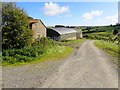 Ummerinvore Road running east past new storage sheds on the site of an abandoned homestead