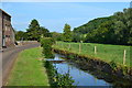 Former mill leat opposite houses at Dinder