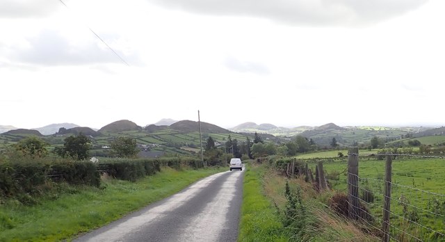 Tate Road descending towards  the junction with Aughanduff Road