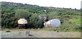 Oil storage tanks in an old quarry on Aughanduff Road