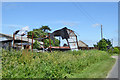 TR2742 : Collapsed barn on Minnis Lane by Robin Webster
