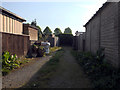 Alley running behind houses on Stockwell Drive and Stockwell Grove