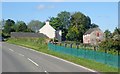 Farmhouse and outbuildings on the North side of the A25