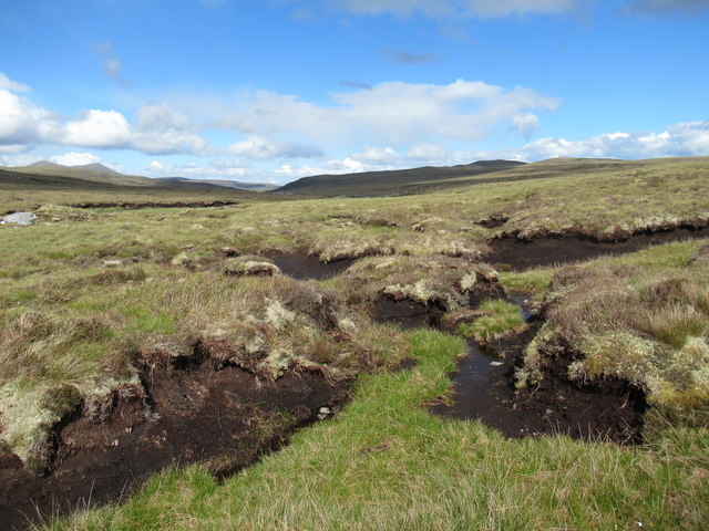 Peaty drainage destined for Abhainn na... © ian shiell cc-by-sa/2.0 ...