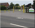 SO9218 : Yellow metal barrier at the entrance to King George V Playing Field car park, Shurdington by Jaggery