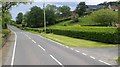 Trimmed hedges alongside the A25 West of Belleek