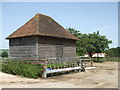 Wooden building opposite Charcroft Farm