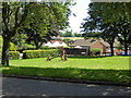 Machinery on small green, Barham