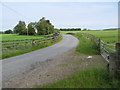 Minor road and bridge crossing Burn of Drimmie