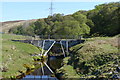 NC8925 : The old road bridge over Suisgill Burn, seen from the new bridge by Tim Heaton