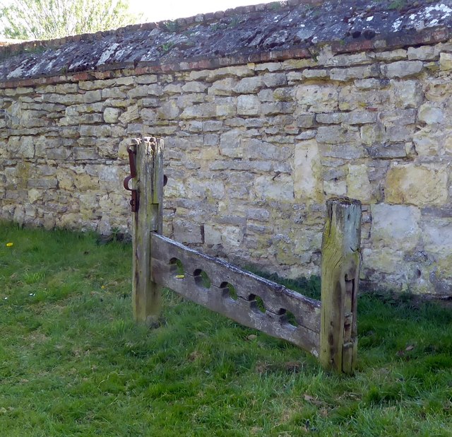 Stocks by boundary wall south of SS Peter & Paul, Dinton