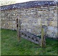 Stocks by boundary wall south of SS Peter & Paul, Dinton